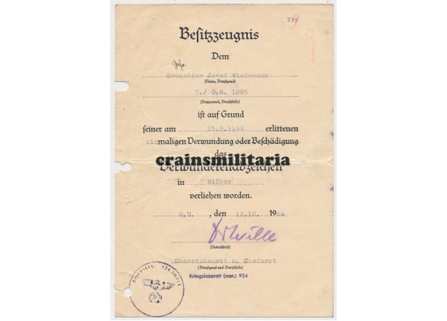 Silver wound badge document 545.GD